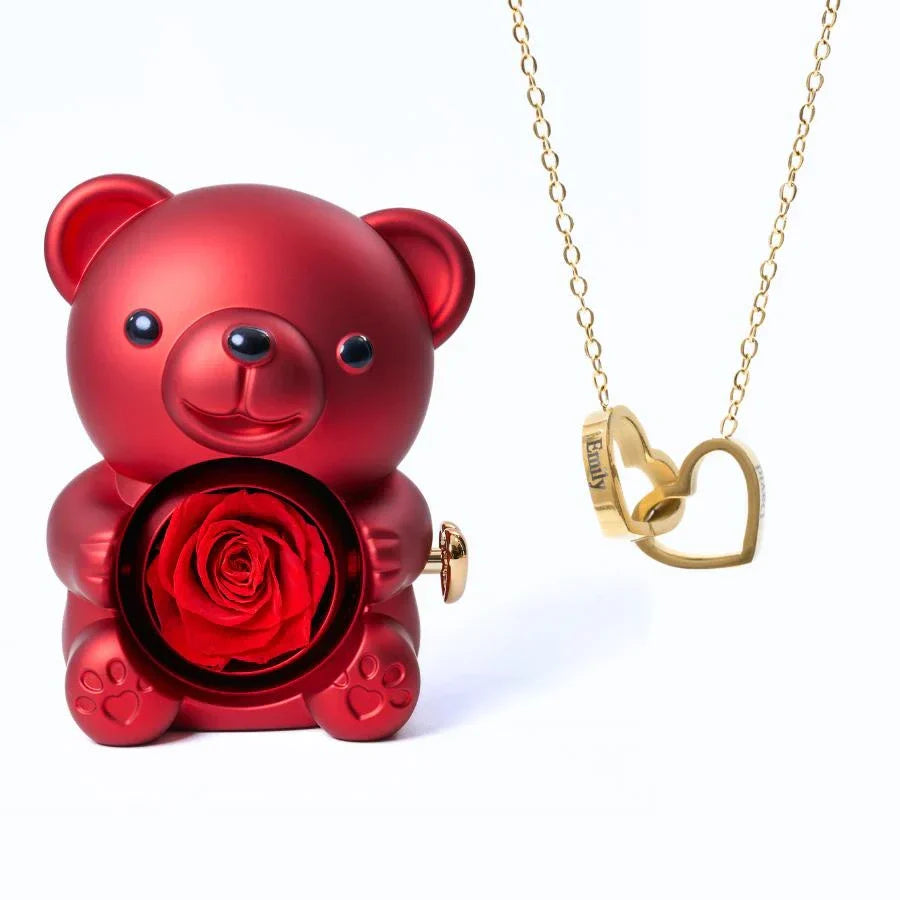 https://cdn.shopify.com/s/files/1/1025/8205/9347/files/Eternal_Rose_Bear_Intertwined_Necklace_-_Red_Gold.webp?v=1771017857